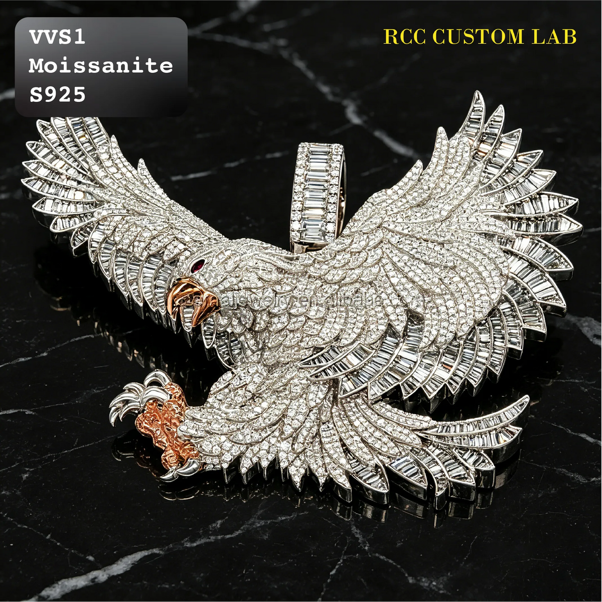 A large eagle pendant covered in clear baguette and round stones, with a rose-gold-toned beak and talons, displayed on a black marble surface. Text overlays read 'VVS1 Moissanite S925' and 'RCC CUSTOM LAB'.