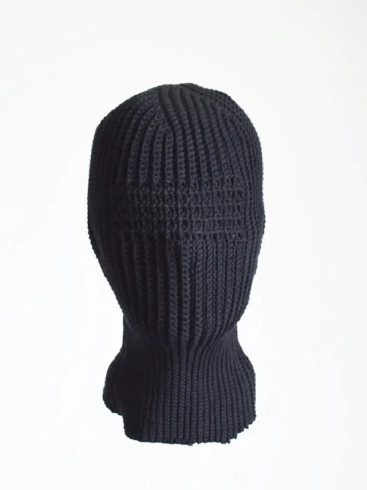 Black thick waffle rib knit full face balaclava ski mask, seamless knitted streetwear face covering displayed on mannequin head against plain white background