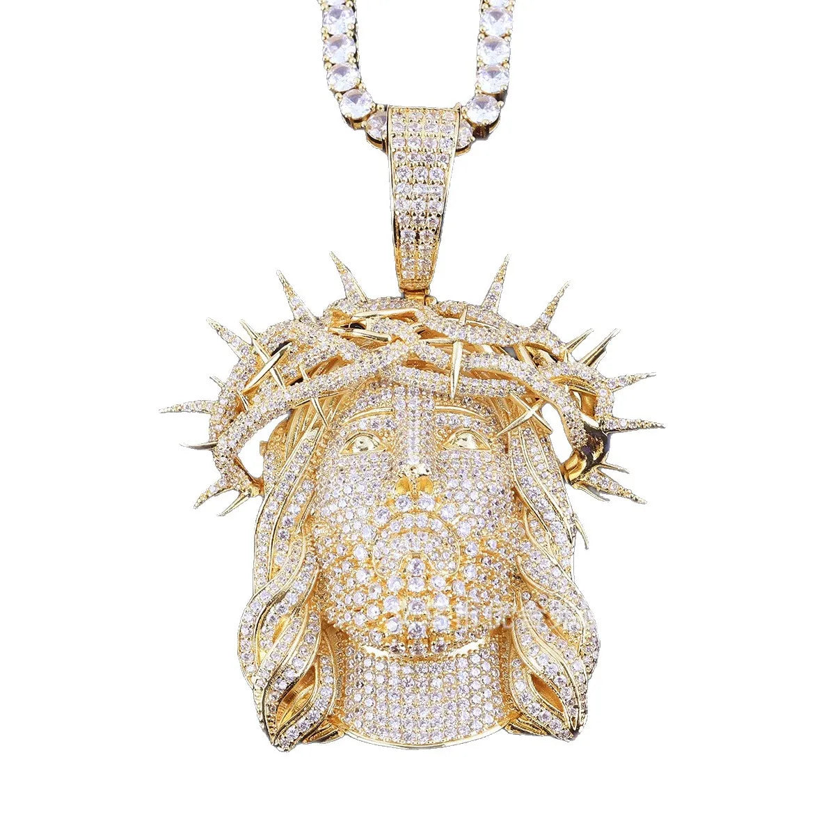 A gold Jesus head pendant covered in clear rhinestones, wearing a crown of thorns, hanging from a matching rhinestone chain against a white background.