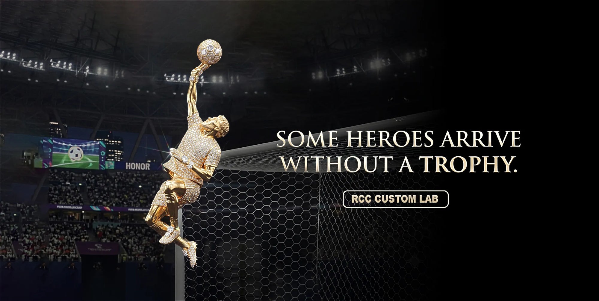 Horizontal banner artwork of fully iced gold soccer player figurine leaping to catch diamond soccer ball above goal net, stadium background with slogan Some heroes arrive without a trophy, RCC Custom Lab custom jewelry promotional graphic