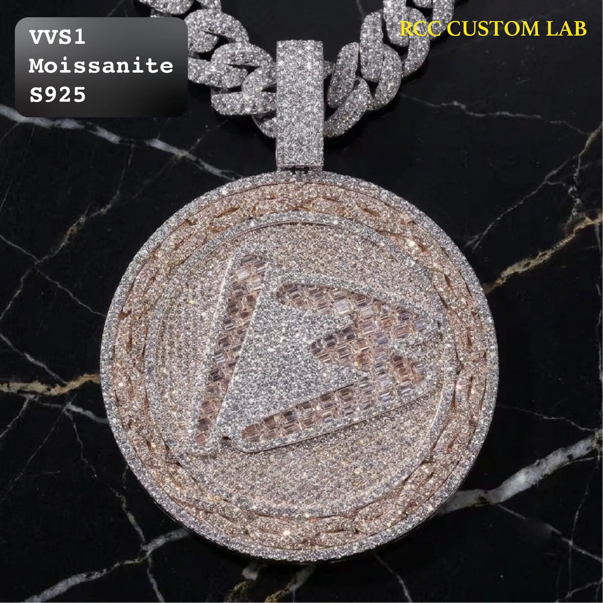 A large round pendant necklace covered in sparkling clear stones, featuring a raised stylized letter design, hanging from a matching chain on a black marble background. Text overlays read 'VVS1 Moissanite S925' and 'RC CUSTOM LAB'.