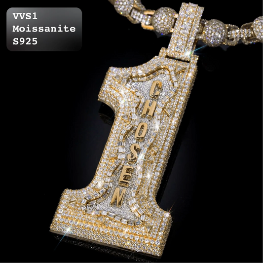 A gold-plated initial '1' pendant covered in clear stones, featuring the name 'CHOSEN' in gold letters, shown on a black background with a matching stone-encrusted chain. A text overlay in the top-left reads 'VVS1 Moissanite S925'.