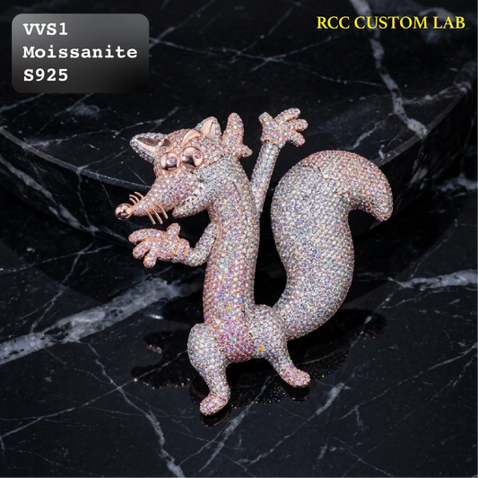A sparkling fox-shaped brooch or pin covered in small iridescent stones, displayed on a black marble surface. Text overlays read 'VVS1 Moissanite S925' in the top-left and 'RCC CUSTOM LAB' in the top-right.