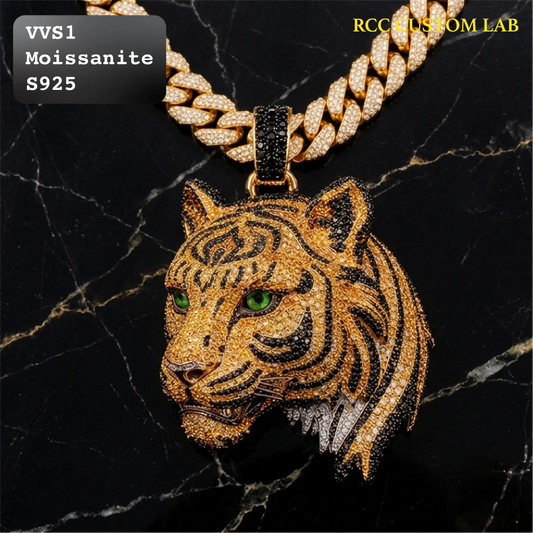 Iced out 3D tiger head pendant featuring yellow and black stone stripes with green eyes paved with VVS1 moissanite in S925 sterling silver.