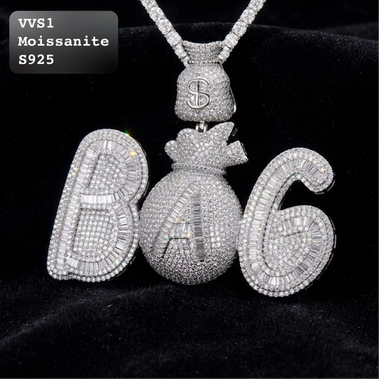 VVS1 moissanite fully iced BAG letter pendant with 3D money bag center design, crafted in S925 sterling silver with baguette and round cut stone paving, paired with moissanite tennis chain on black velvet background